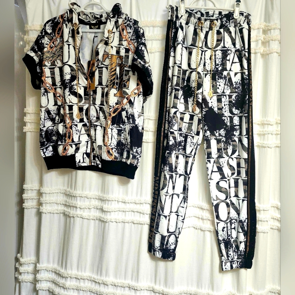 BNWT TATU, Designer Set. SIZE 40.. No Further Reduction In Price!